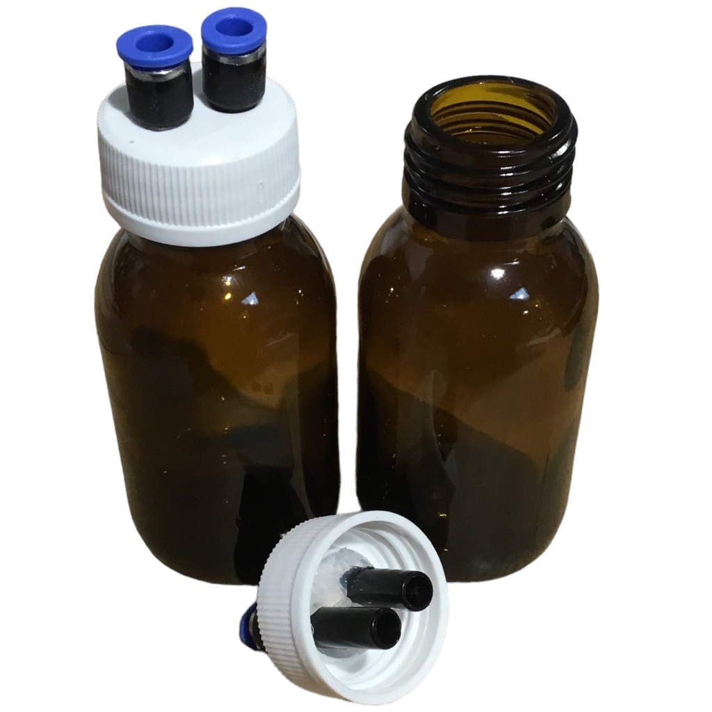 Bouteille pour pompe à gelée Royale Lyson détail d'un bouchon retiré