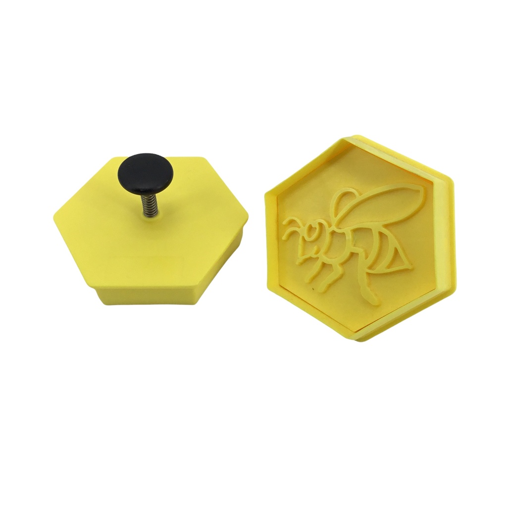 Emporte-pièces/cachet hexagonal avec motif abeilles